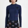 Arty geripptes T-Shirt mit Volants Arty geripptes T-Shirt mit Volants