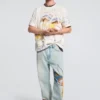 Bedrucktes T-Shirt mit Motiven Bedrucktes T-Shirt mit Motiven