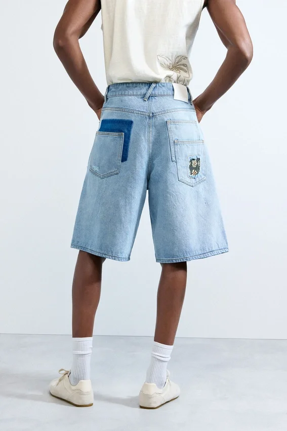 Denim-Bermudas mit Aufnähern Denim-Bermudas mit Aufnähern