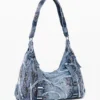 Denim-Tasche mit Schnallen Denim-Tasche mit Schnallen