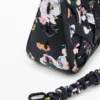 Kleine geflochtene Collage-Tasche Kleine geflochtene Collage-Tasche