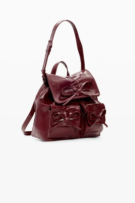 Kleine glänzende Rucksackschleife Kleine glänzende Rucksackschleife