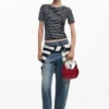Kleine Tasche mit Blumenapplikation Kleine Tasche mit Blumenapplikation