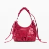 Kleine Tasche mit Blumen-Applikationen Kleine Tasche mit Blumen-Applikationen