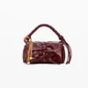 Kleine Tasche mit glänzender Schleife Kleine Tasche mit glänzender Schleife