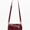 Kleine Tasche mit glänzender Schleife Kleine Tasche mit glänzender Schleife