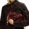 Kleine Tasche mit glänzender Schleife Kleine Tasche mit glänzender Schleife