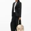 Kleiner bestickter Rucksack Kleiner bestickter Rucksack