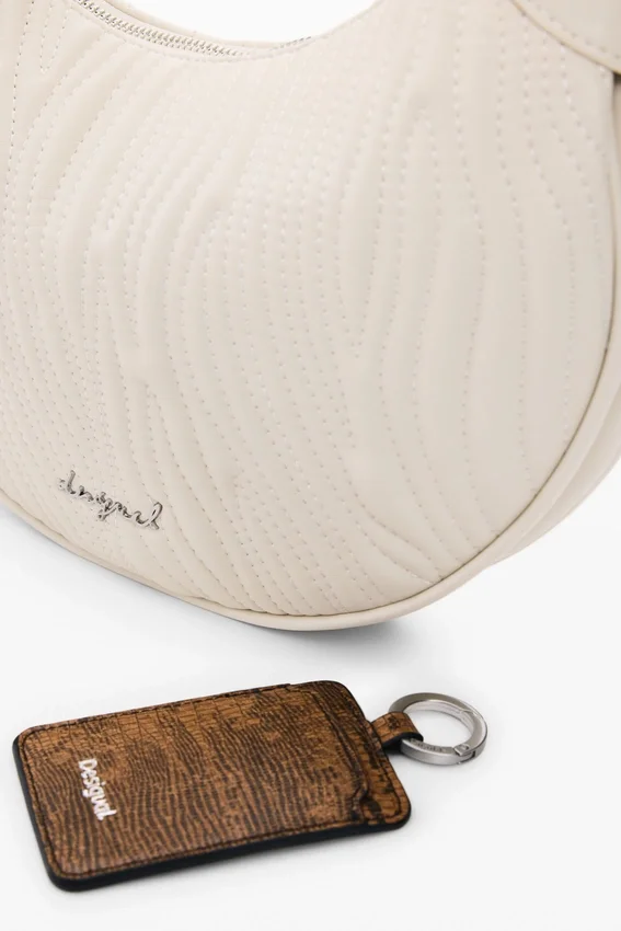 Mittlere ovale Tasche mit Prägung Mittlere ovale Tasche mit Prägung