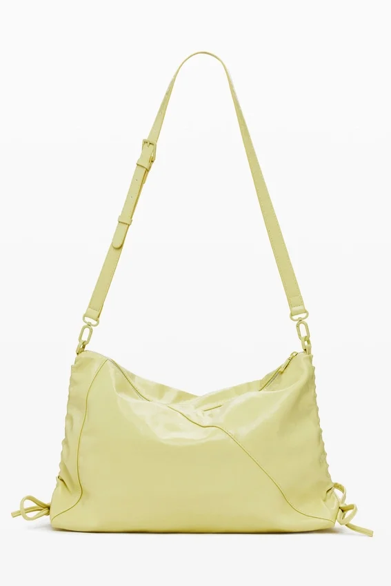 Mittlere Tasche mit glänzender Schleife Mittlere Tasche mit glänzender Schleife
