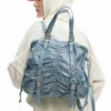 Mittlerer Rucksack aus Denim mit Rüschen Mittlerer Rucksack aus Denim mit Rüschen