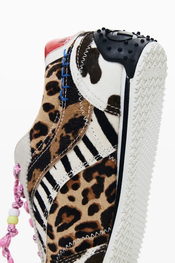 Sneaker mit Patchwork-Tierprint Sneaker mit Patchwork-Tierprint
