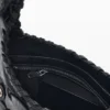 Tasche aus Kunstleder mit Nieten Tasche aus Kunstleder mit Nieten