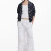 Wandelbare Hose mit Blumen von Tyler Mcgillivary Wandelbare Hose mit Blumen von Tyler Mcgillivary