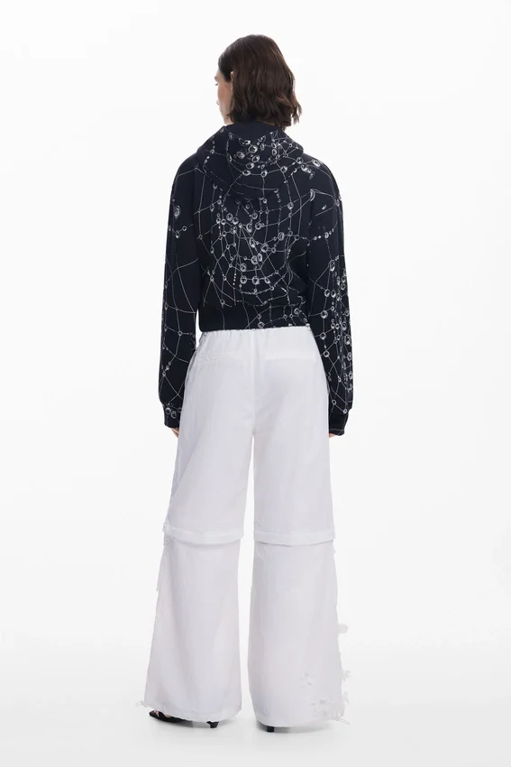 Wandelbare Hose mit Blumen von Tyler Mcgillivary Wandelbare Hose mit Blumen von Tyler Mcgillivary
