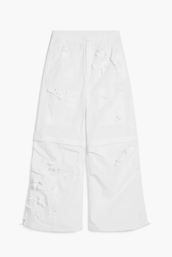 Wandelbare Hose mit Blumen von Tyler Mcgillivary Wandelbare Hose mit Blumen von Tyler Mcgillivary