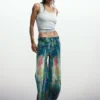 Weit geschnittene Splatter-Jeans Weit geschnittene Splatter-Jeans