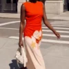Zweifarbiges Blumenkleid Zweifarbiges Blumenkleid